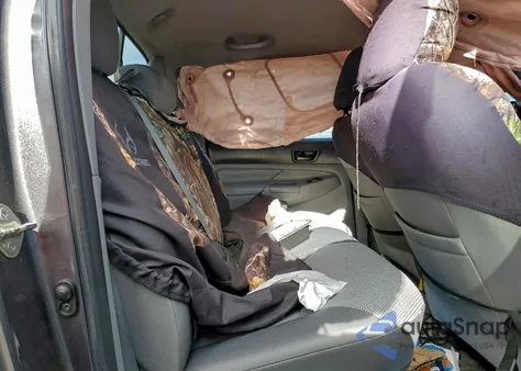 2015 Toyota Tacoma Double Cab z USA, uszkodzony, nr VIN 5TFLU4EN3FX129587